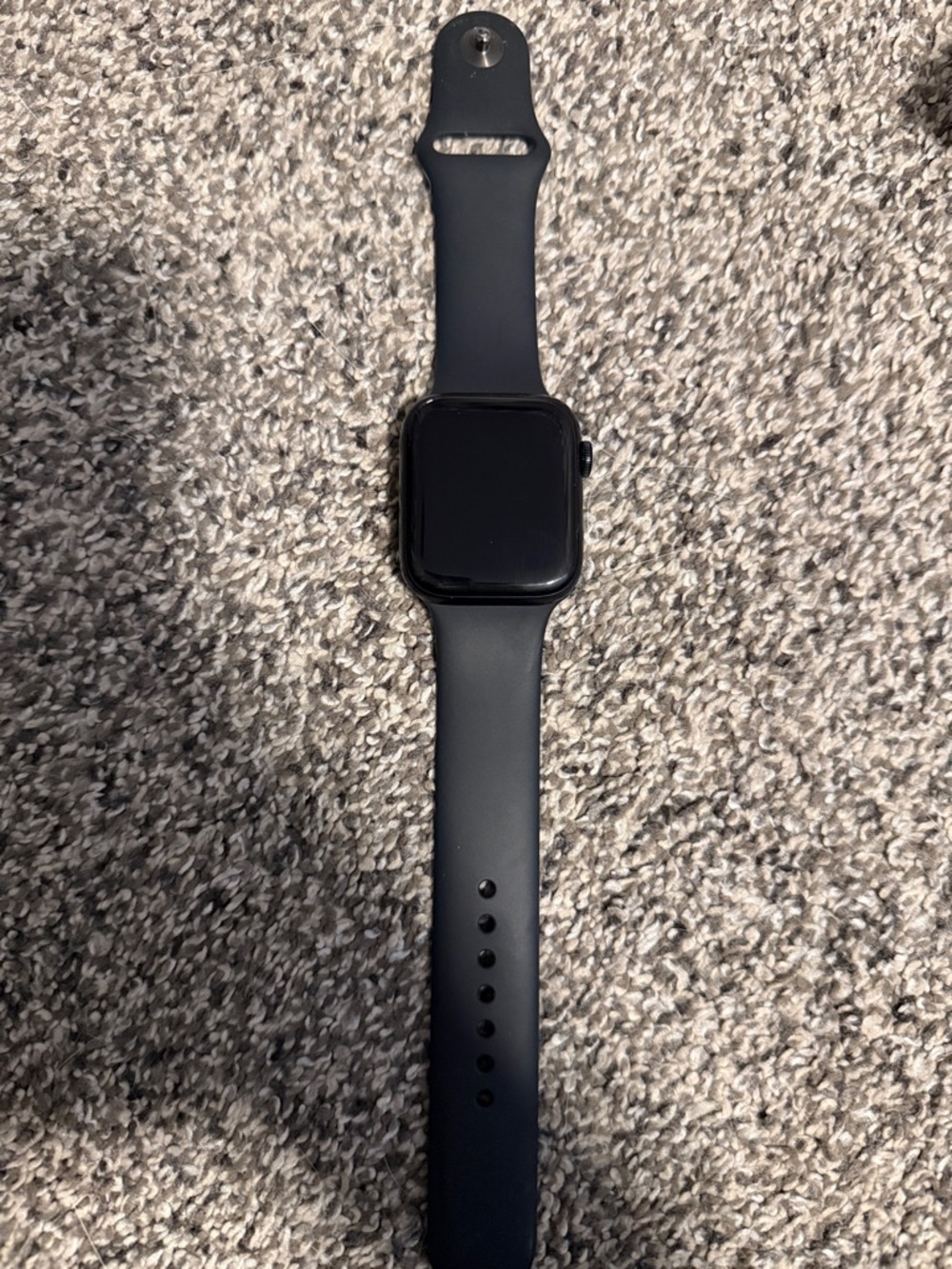 Apple Watch SE 44mm with charger cord